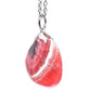 Smooth rhodochrosite pendant with chain or rubber