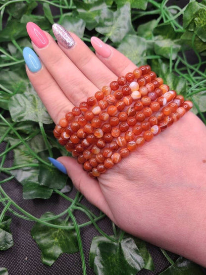 Carnelian - elastic bracelet in worked spheres