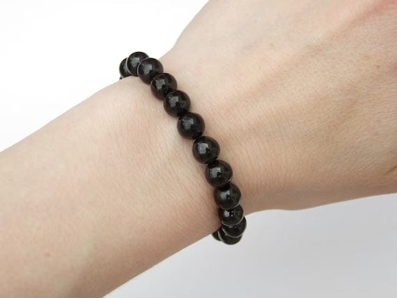 Black onyx - elastic bracelet in worked spheres