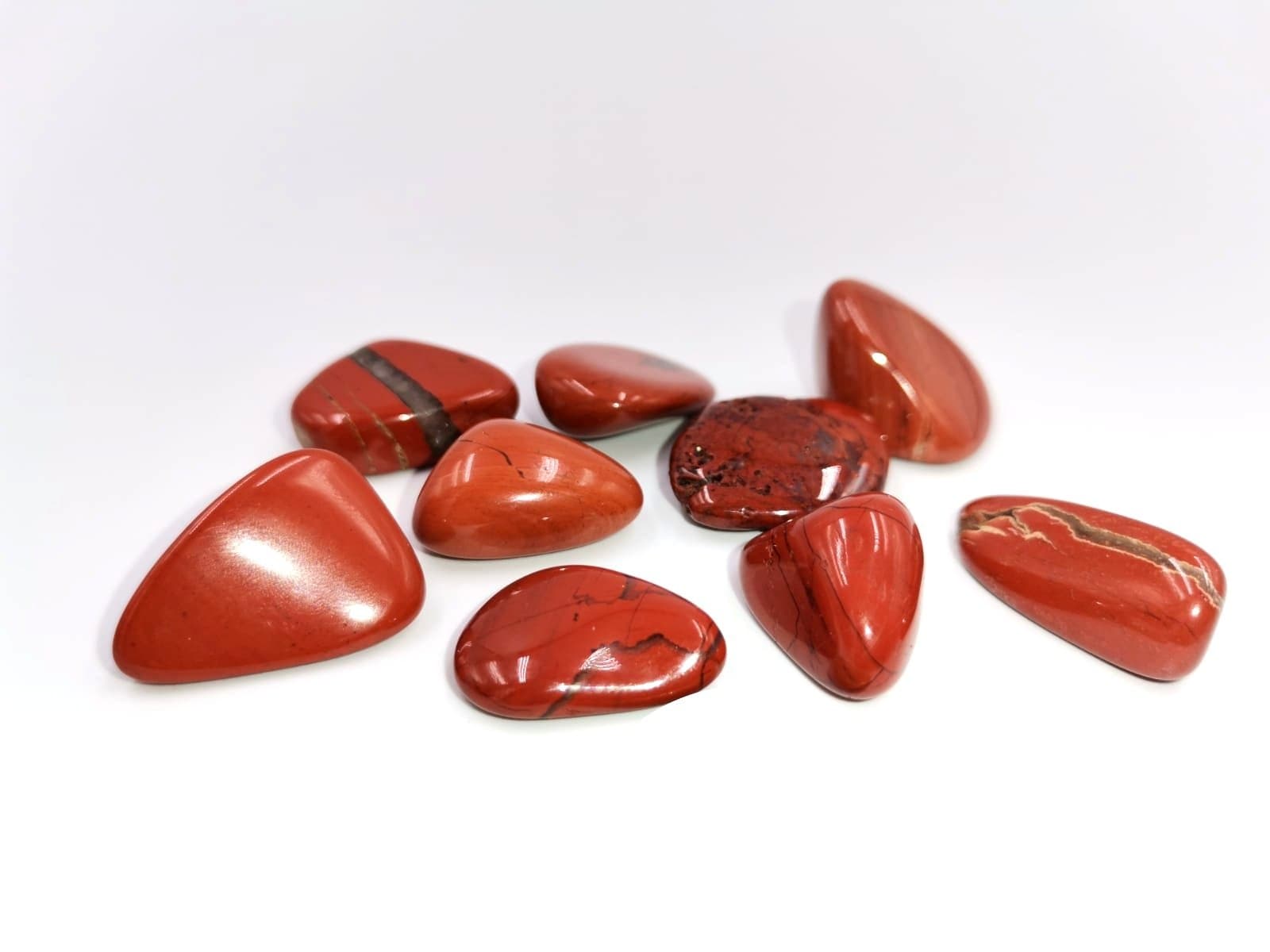 Tenetpietre Diaspro rosso levigato da 20-25 mm. Disponibile in confezioni da 1, 5 e 10 pietre